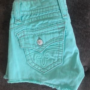 **ISO** these Rock Revival shorts size 27